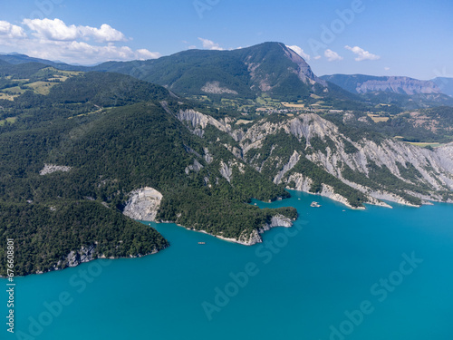 Aerial view on blue Lake of Serre-Poncon, reservoir border between Hautes-Alpes and Alpes-de-Haute Provence   departments, one of largest in Western Europe