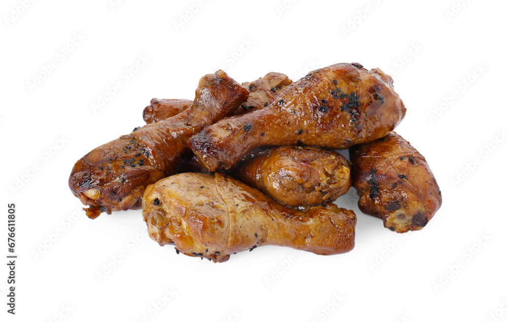 Pile of chicken legs glazed with soy sauce isolated on white Pile of chicken legs glazed with soy sauce isolated on white