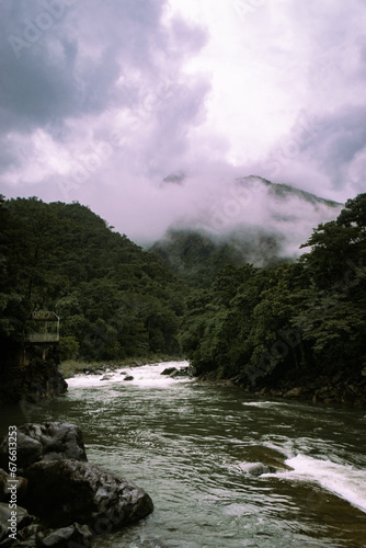 Cantingas River along Mt. Guiting-guiting on a gloomy day. Portrait. San Fernando, Romblon, Philippines