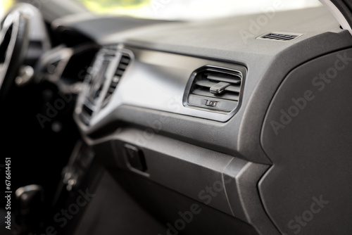 Air vent and airbag module in car, closeup © New Africa