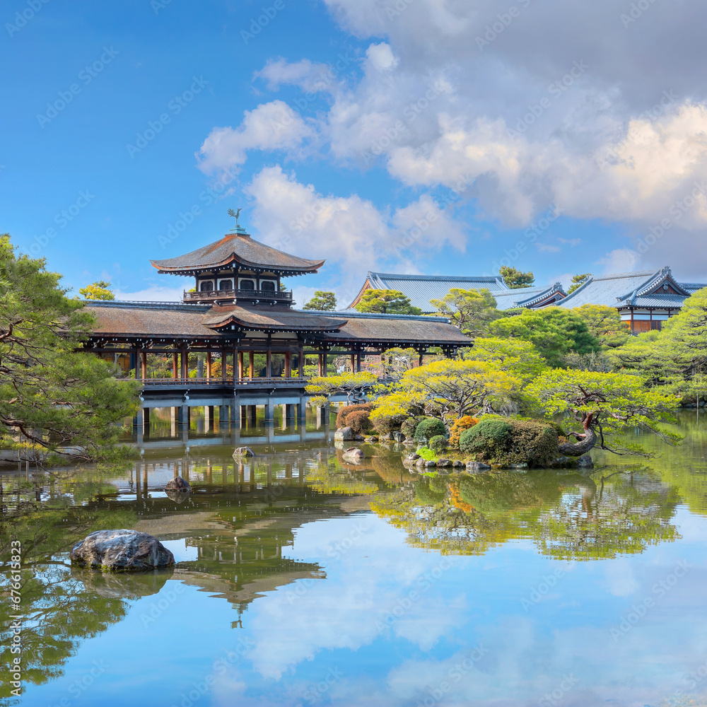 Kyoto, Japan - April 2 2023: Heian Jingu Garden is a garden with a variety of plants, ponds and buildings and weeping cherry trees, making it's one of the best cherry blossom spots in Kyoto Kyoto, Japan - April 2 2023: Heian Jingu Garden is a garden with a variety of plants, ponds and buildings and weeping cherry trees, making it's one of the best cherry blossom spots in Kyoto