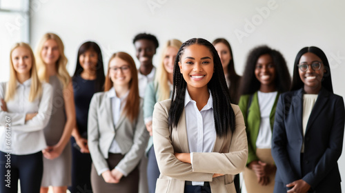 A diverse, confident group of women in business attire, united