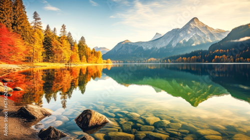 Beautiful autumn landscape with mountain lake and reflection in crystal clear water