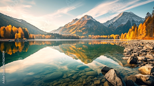 Beautiful autumn landscape with mountain lake and reflection in crystal clear water © Formoney