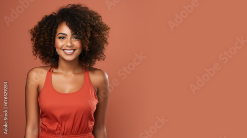 Afro-american woman model wearing a red sundress isolated on pastel