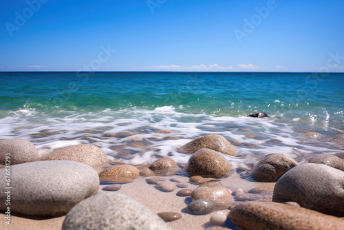 Beautiful seascape with pebble beach and blue sky background. High quality photo