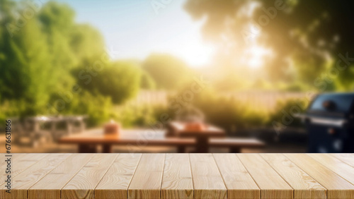 Empty wooden table and blurred bbq in the backyard background, for product display montage. High quality photo photo