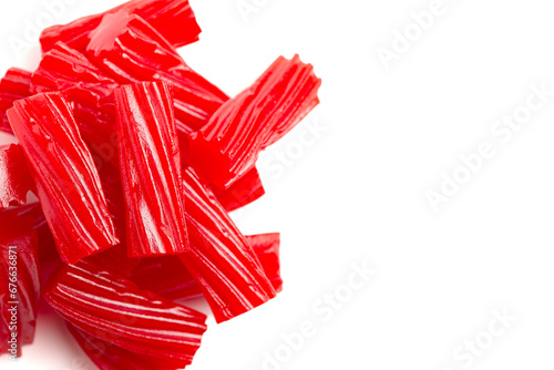 Traditional Red Licorice Pieces Isolated on a White BackgroundRed Licorice Pieces Isolated on a White Background photo