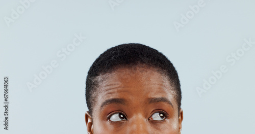 Idea, space and eyes with woman in studio for mockup, planning and opinion. Question, why and confused with closeup face of african person thinking on grey background for guide, remember and choice