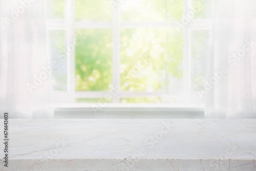 Selective focus.Elegance product display background with marble top with curtain and vine leaf on window garden in morning