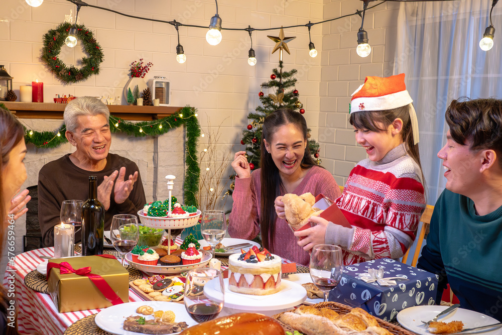 Happy people are celebrating on a table meal when christmas and new year at home.