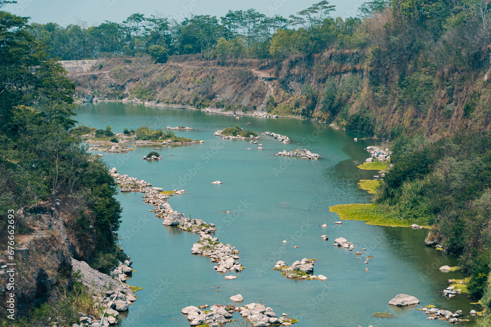 Aerial photo of a river that resembles a lake during the long dry season. Drone photo showing a clear river that doesn't flow until it finally becomes a puddle that resembles a lake