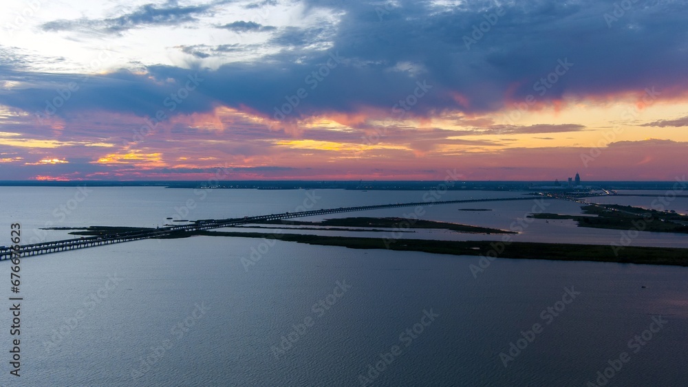 Mobile Bay causeway and the Jubilee Parkway bridge at sunset