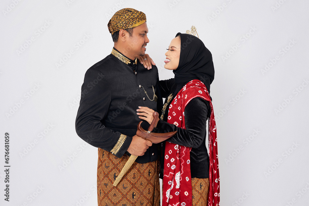 Portrait of smiling happy couple husband and wife wearing java ...