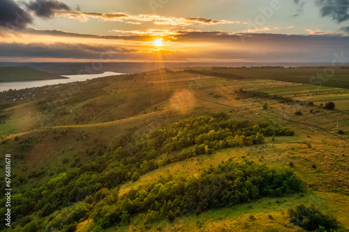 Aerial view, forests, mountains in Ukraine in summer, fog and dawn. Travel concept, weekend, vacation