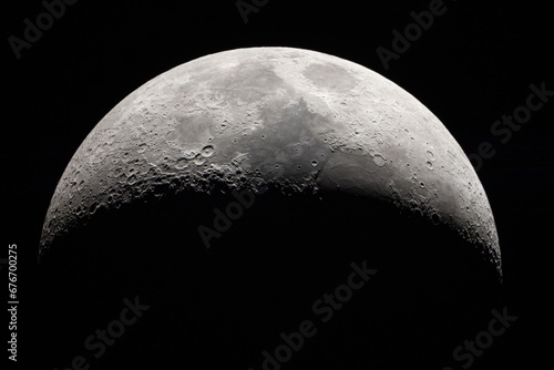 Moon Closeup Showing Details of Lunar Surface. Black Background.