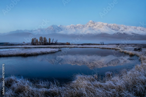 Blue hour in the mountains. North Chuysky Range and Lake Dzhangy