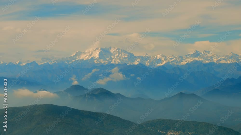 Aerial View over Beautiful Mountainscape over Mountain Valley with Snow Capped Monte Rosa and Mountain Peak Matterhorn From Ticino, Switzerland. Aerial View over Beautiful Mountainscape over Mountain Valley with Snow Capped Monte Rosa and Mountain Peak Matterhorn From Ticino, Switzerland.