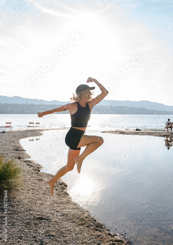 sporty girl at the beach, girl at the lake, jumping girl
