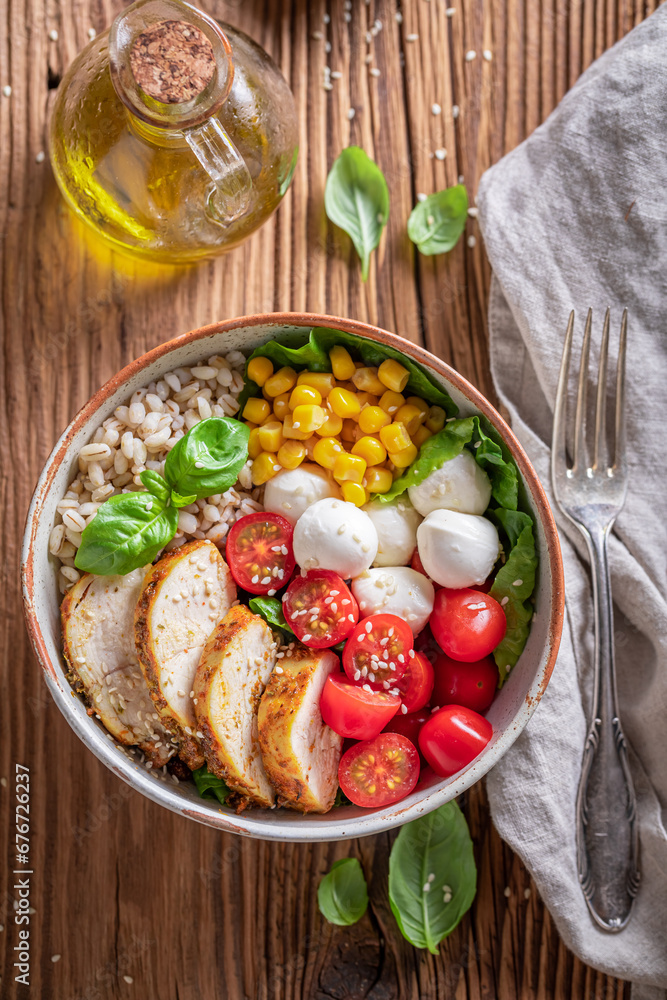 Fresh Caesar salad with chicken, cheese and groats. Fresh Caesar salad with chicken, cheese and groats.
