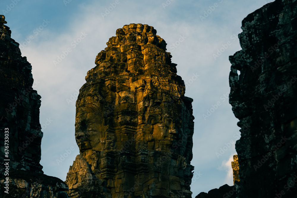 Naklejka premium As the sun sets. Bayon temple, Siem Reap, Cambodia in the late evening light.