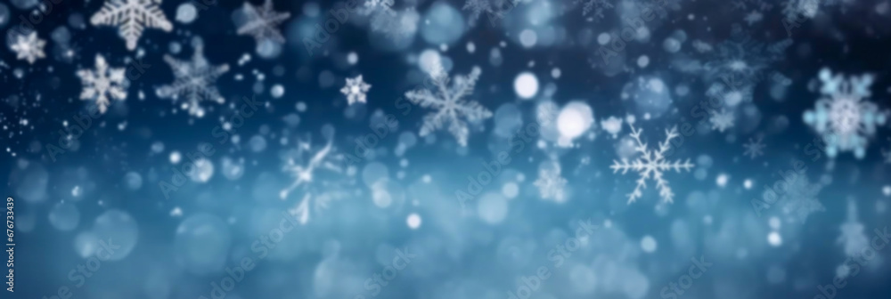 Falling snowflakes on a blue background. Winter background. Banner.