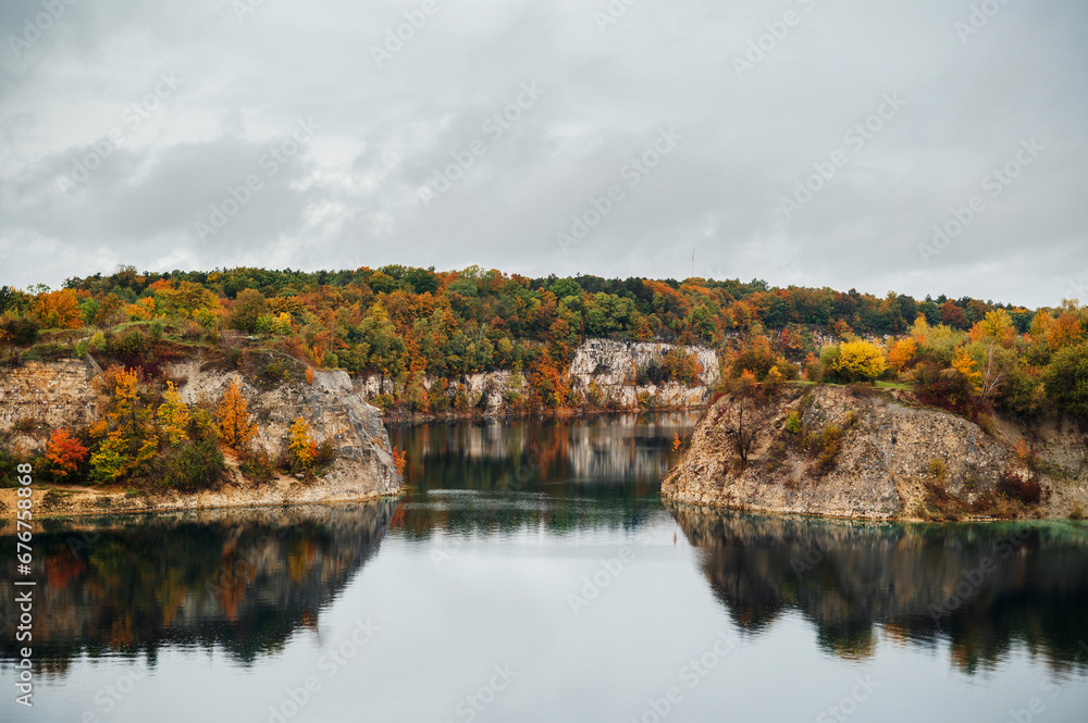 Autumn landscape with lake in the Zakrzówek Quarry, Krakow