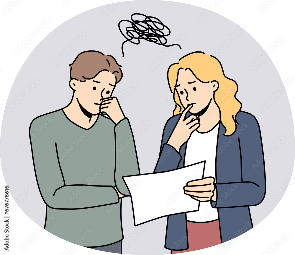 Pensive colleagues brainstorm over paperwork Pensive colleagues brainstorm over paperwork