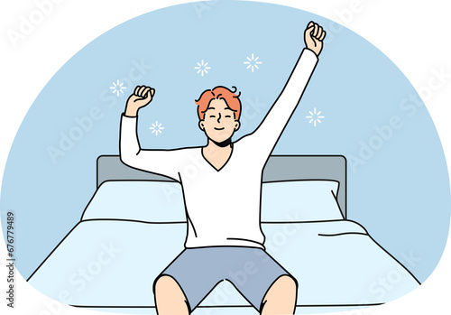 Slika na platnu Happy man stretch in bed