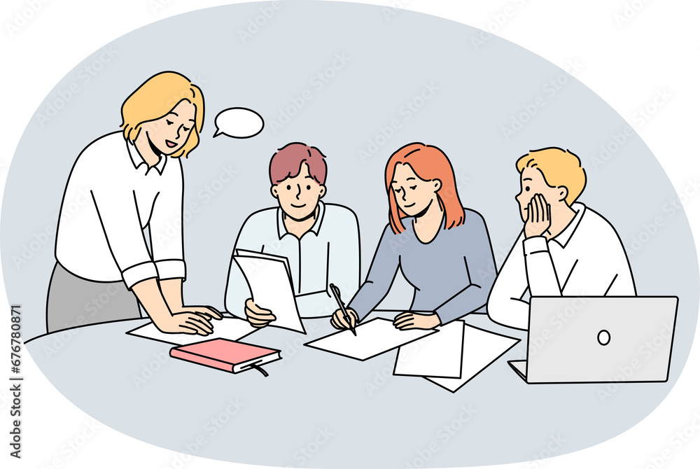 Businesspeople discuss paperwork at meeting Businesspeople discuss paperwork at meeting