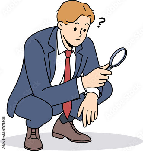 Business man with magnifying glass squats doing work of analyst or supervisor conducting audit
