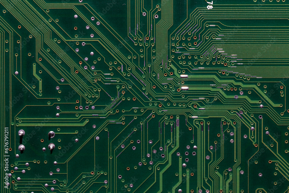 back side of green digital circuit board - flat full-frame background and texture.