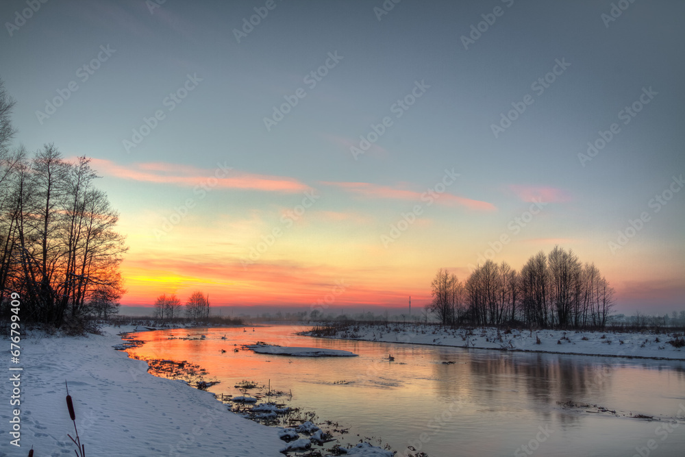 landscape winter trees and fields covered by snow in Poland, Europe on sunny day in winter, amazing clouds in blue sky landscape winter trees and fields covered by snow in Poland, Europe on sunny day in winter, amazing clouds in blue sky
