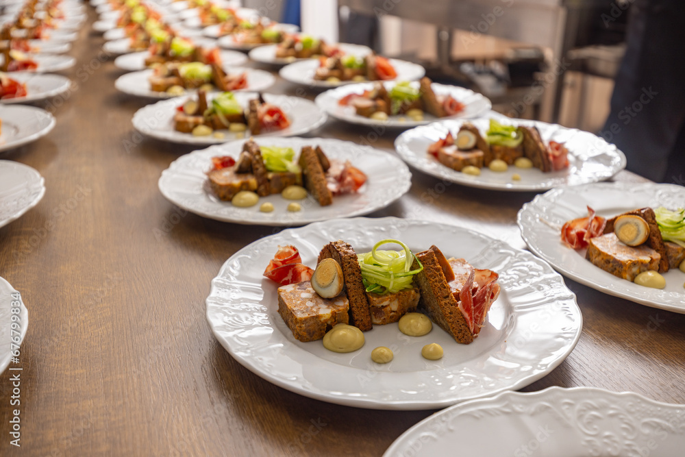 Multiple plates of beautifully presented food