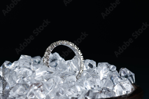 Gold ring with diamond in pieces of ice.