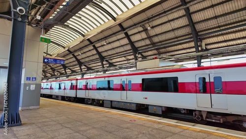 
Bangkok,Thailand-November,09,2023:
Red Line Skytrain from Bang Sue Central Station to Rangsit Help transport passengers 
from the center of Bangkok to the suburbs.  photo