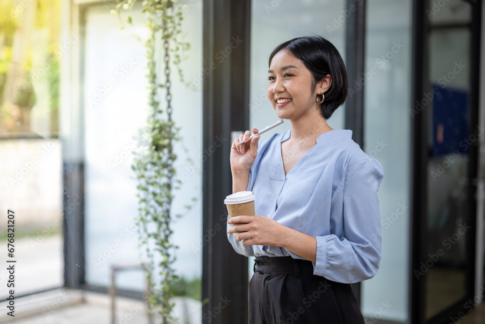 Business woman still thinking about work in a good mood during coffee break. Business woman still thinking about work in a good mood during coffee break.