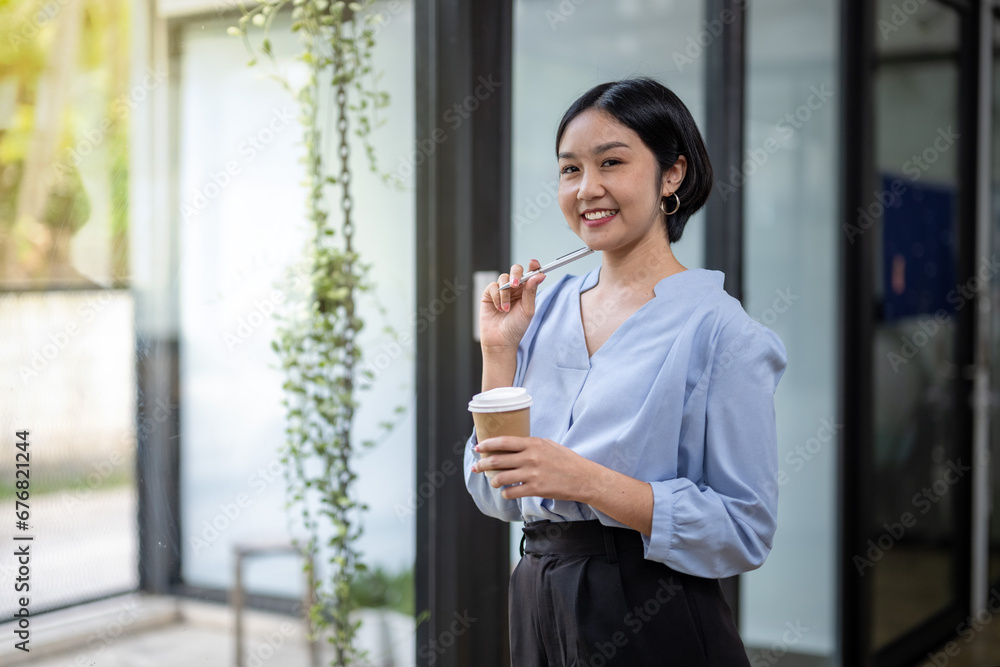 Business woman still thinking about work in a good mood during coffee break. Business woman still thinking about work in a good mood during coffee break.