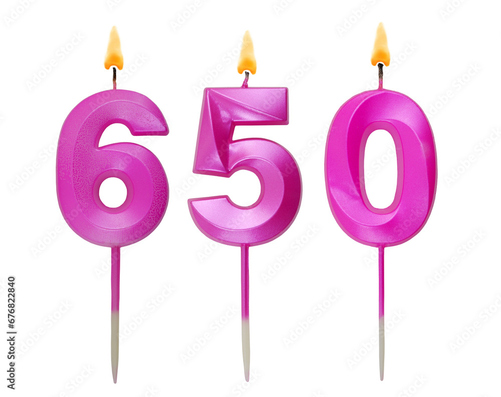 Burning pink birthday candles isolated on white background, number 650. Burning pink birthday candles isolated on white background, number 650.