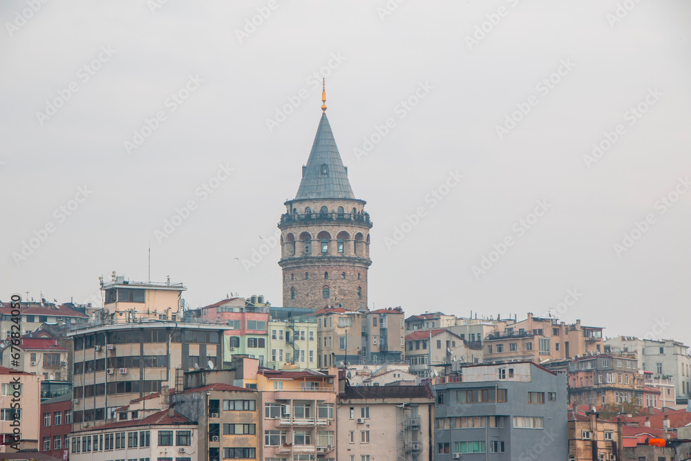 Galata Tower in Beyoglu district and old houses. Istanbul, Turkey