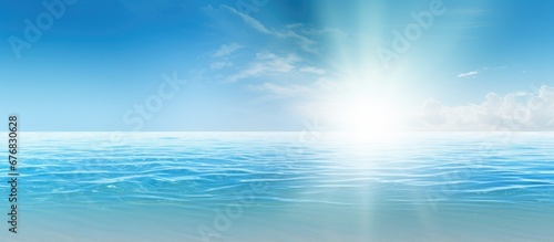 In the abstract and enchanting background of nature the summer sun radiates a soothing blue color shimmering on the water s surface while the walls of earth are covered in sand reminiscent 