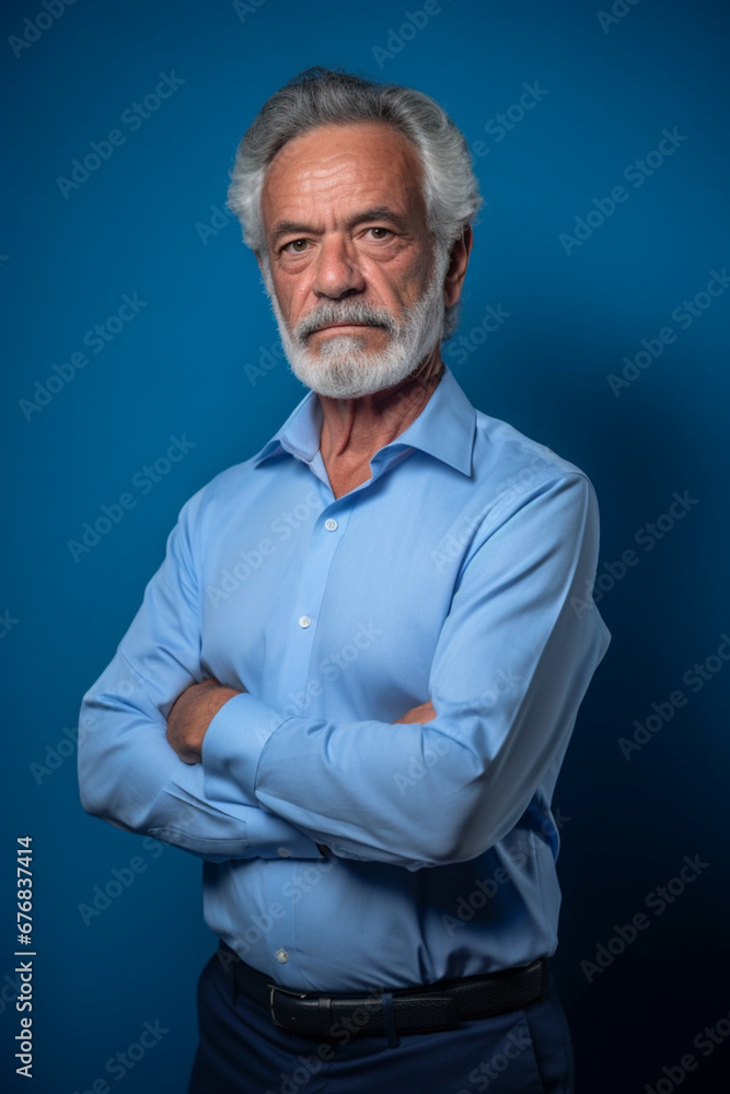 Older, Elegant Man in a Business Suit Poses Gracefully Against a Serene Blue Background, Symbolizing Timeless Sophistication and Authority, AI generated Older, Elegant Man in a Business Suit Poses Gracefully Against a Serene Blue Background, Symbolizing Timeless Sophistication and Authority, AI generated
