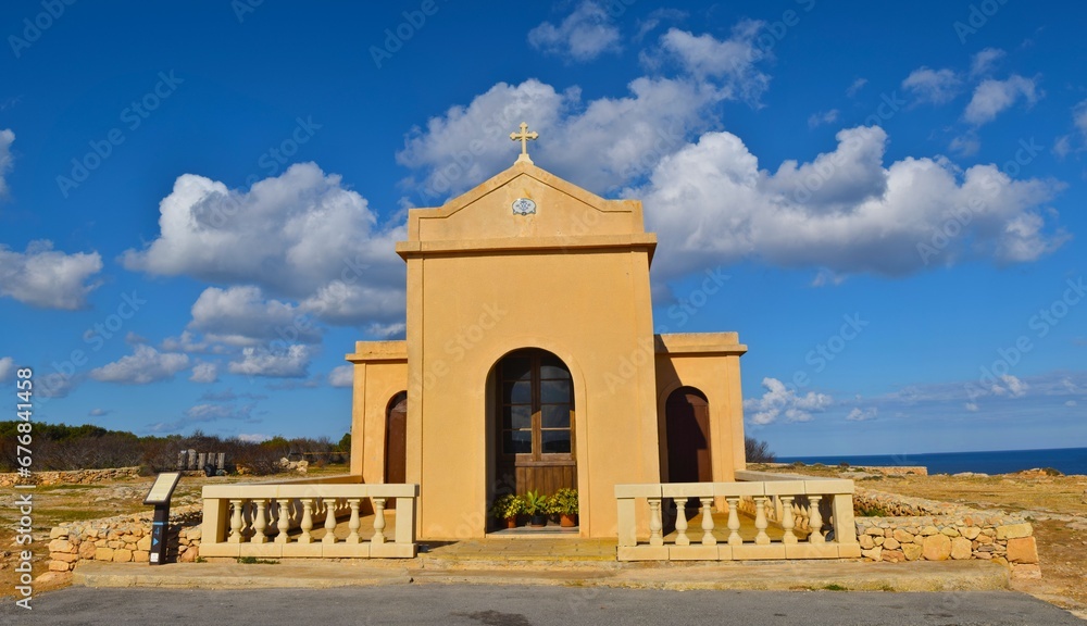 Obraz premium Chapel of the Immaculate Conception on a sunny day with cloudy sky background