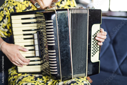 A girl playing accordion