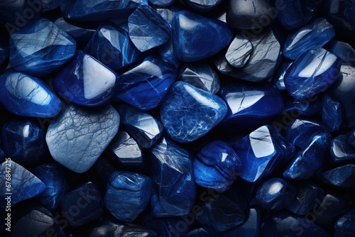 Blue pebbles texture as background, top view. Closeup