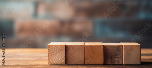 A stack of wooden blocks cube on top of a wooden table. Copy space, Business art concept