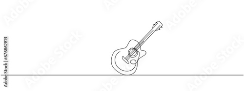 One single line drawing of wooden classic acoustic guitar. Modern stringed music instruments concept continuous line draw design vector illustration graphic photo