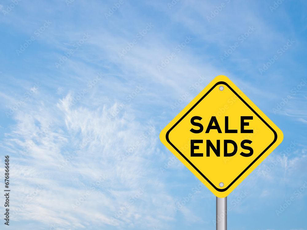 Yellow transportation sign with word sale ends on blue color sky background Yellow transportation sign with word sale ends on blue color sky background
