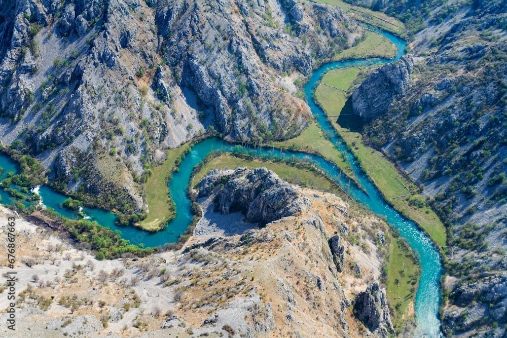Φωτογραφία Aerial view of the confluence of  of the Krupa and Zrmanja Rivers and their cany