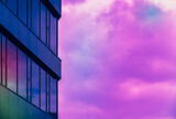 Minimalistic abstract background with generic commercial building and cloudy sky painted in pastel saturated colors